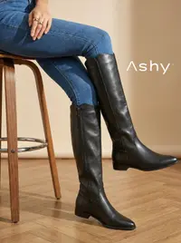 جزمة اسود طويلة جلد صناعي بكعب عريض 1